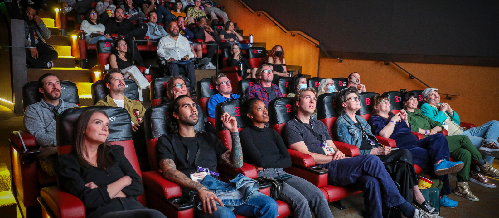 An audience in a movie theater watching Series Fest